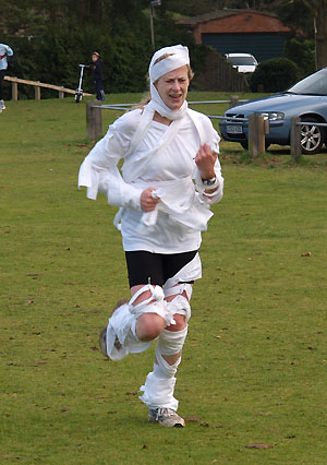 Sally Lawrence completing the 2005 Club Handicap race encased in bandages!