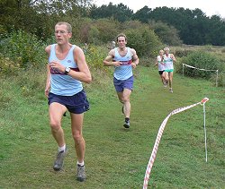 Steve Kitson leads Andy Eakins running at the 2007 HXCL race at Farley Mount