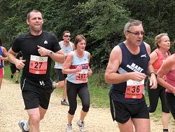 Runners in the woods in the 2009 Alice Holt Forest Races
