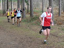 Ian Carley racing through the Bourne Woods at 2012 TRXCL race in Farnham
