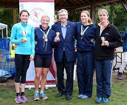 Haslemere Borders ladies team being presented with trophies at 2016 Alice Holt Races
