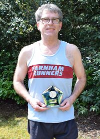 Michael Walberton with parkrun trophy