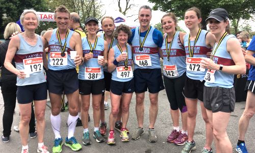Farnham Runners group with their medals after the 2017 Alton 10