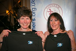 Lindsay Bamford and Kay Copeland receiving T-shirts