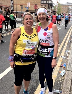 Carolyn Wickham and Jackie Wilkinson stopped for photo on the course