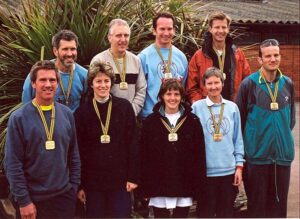 Group with medals after 2000 London Marathon