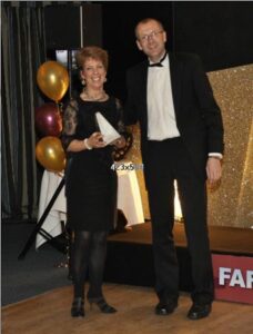 Shirley Perrett receiving trophy at 2012 Annual Awrads Dinner