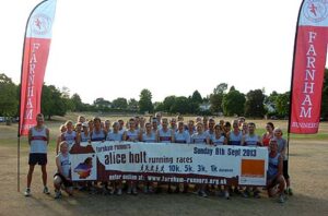 Group with banner at 2013 Alice Holt Races