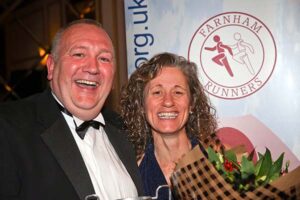 Sarah Hill being presented with marathon trophy at 2017 Annual Awards Dinner