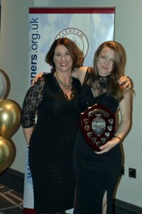 Helen Bracy being presented with Steve Parker Award at 2019 Annual Awards Dinner