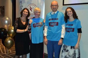 Members with prize T-shirts at 2019 Annual Awards Dinner