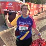 Alison Mungall giving a thumbs up after finishing the 2021 London Marathon