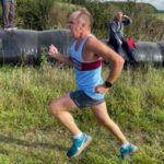 Justin Clarke showing his good running form in the 2021 SXCL Folly Farm race