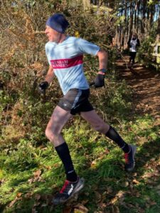 Former race director Charles Ashby was 7th back for Farnham in the 2021 SXCL Bourne Woods race