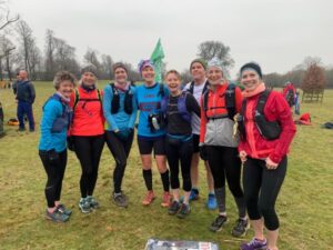 Eight runners kitted out for their 13 mile training run home from the 2022 SXCL Chawton House