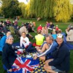 Group enjoying a Jubilee tea on Gostrey Meadows after the 2022 Platinum Jubilee run