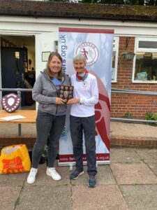 F65 winner Jane Georghiou is presented with her trophy at the 2022 Club Championship