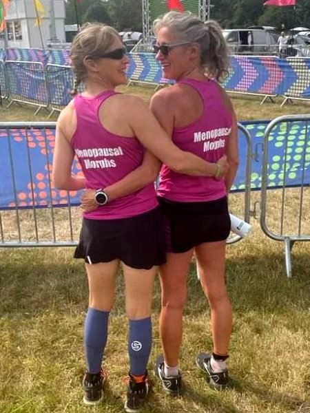 Emma Pearson and Sarah Hill wearing their team T-shirts at the 2022 Endure 24 race