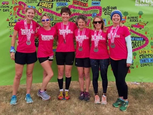 Ali Falkiner, Kate Townsend, Lindsey Bamford, Marisa Luttrell and Vicky Goodluck with their medals after the 2022 Endure 24 race