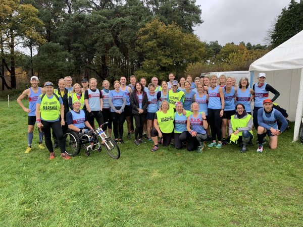 Farnham Runners assemble before the start of the 2022-23 SXCL Bourne Woods cross-country in Farnham