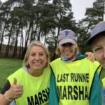 Last runner marshals, Carolyn Wickham, Tori Shaw and Nicola O'Connor at the 2022-23 SXCL Bourne Woods cross-country in Farnham