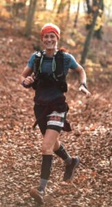 Sarah Hill running in the Wendover Woods during the 2022 Centurion Marathon