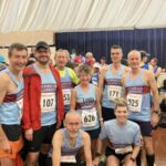 Farnam Runners contingent isdide keeping dry before the 2022 Hayling 10