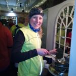 Lina Haines serving out the mulled wine at the 2022 Mince Pie Run
