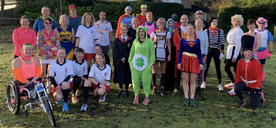 Farnham Runners pose in fancy dress before the start of the 2022 Club Handicap