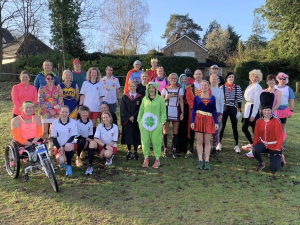 Farnham Runners pose in fancy dress before the start of the 2022 Club Handicap