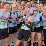Group of Farnham Runners with their race mementos after the 2023 HRRL Stubbington 10k