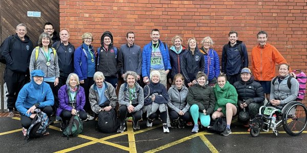 Group of Farnham Runners in Farnham in the rain after the 2023 HRRL Stubbington 10k