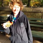 Linda Tyler after the 2016 New York Marathon with her medal