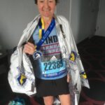 Linda Tyler after the 2019 Boston Marathon with her medal