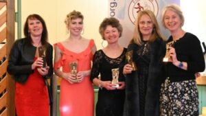 Ladies' Grand Prix winners with trophies, Kay Copeland, Louise Granell, Linda Tyler, Sue Taylor, Bridget Naylor, at the 2022-23 Farnham Awards Dinner