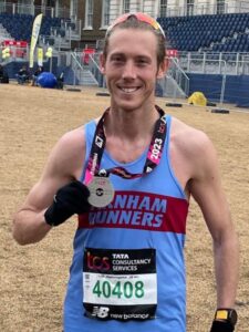 Chris Matthews with his medal after the 2023 London Marathon