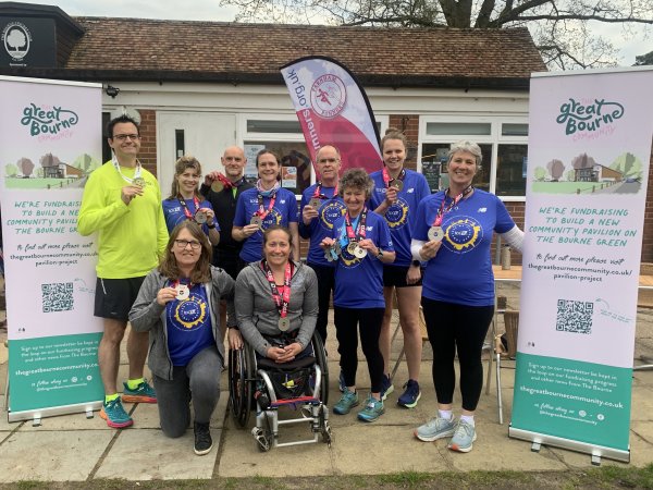 Some Farnham Runners at the clubhouse with their 2023 London Marathon medals