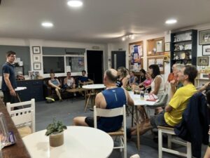 Physical therapist Will Lane speaks at one of the Farnham Runners post run Bar Talks