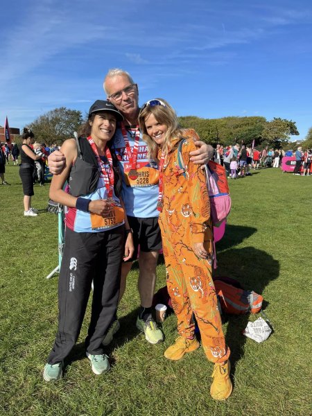 Farnham Runners Candy Waller, Chris Gill and Gemma Whitehouse after the 2023 Great South Run