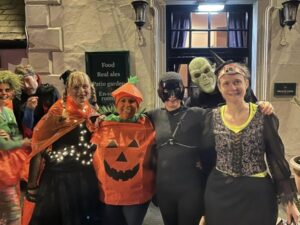 Some of the characters in fancy dress costumes at the 2023 Farnham Runners Halloween run, organised by Clair Bailey (right)