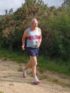 Bruce Peto completing his 100th parkrun at the Hogmoor Enclosure on his 81st birthday