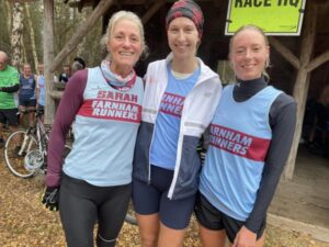 Three of the ladies' of the winning Farnham Runners team, left to right Sarah Hill, Lizzie May and Kayleigh Copeland, after the 2023 SXCL Alice Holt cross-country