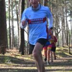 Howard Inns running the the woods at the 2024-25 SXCL Bourne Green cross-country