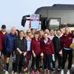 Group of Farnham Runners competitiors and their supporters at Greenwich before the start of the 2025 London Marathon