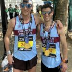Chris Matthews and Joe Collins with their medals and looking remarkably fresh after the 2025 London Marathon