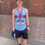 Richard Steedman with his 2025 Manchester Marathon medal