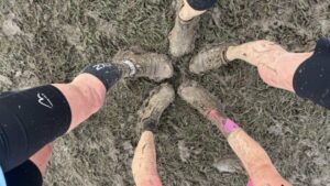 Close up of the the ladies team muddy trainers after the 2025 England National Cross-Country Championship at Parliament Hill