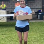 Candy Waller with her 1st F55 prize at the 2025 HRRL Alresford 10k