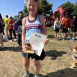 Linda Tyler of Farnham Runners with her 2025 Netley 10k prize and trophy
