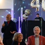 Founder member John de Moraes gives a speech at the Farnham Runners 40th Anniversary, introducing Brian Steward to recent members